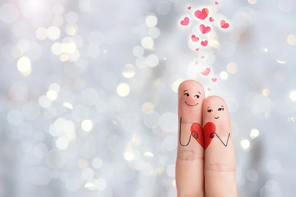 Finger art of a Happy couple. Lovers is embracing and holding red heart. Stock Image — Stock Photo, Image