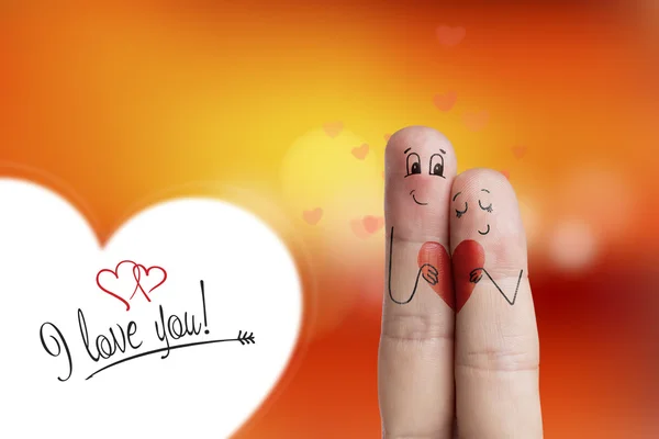 Arte de dedos. Los amantes están abrazando y sosteniendo el corazón rojo. Imagen de stock —  Fotos de Stock