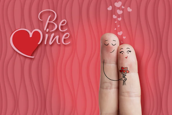 Finger art of a Happy couple. Man is giving bouquet. Stock Image — Stock Photo, Image