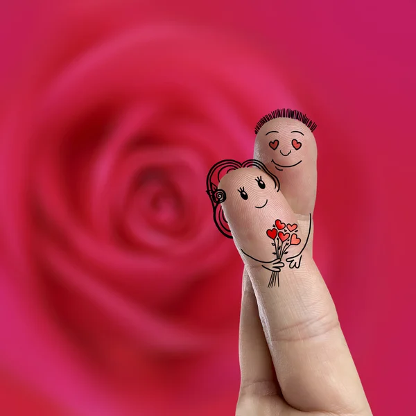 Finger art of a Happy couple. Man is giving bouquet. Stock Image — Stock Photo, Image