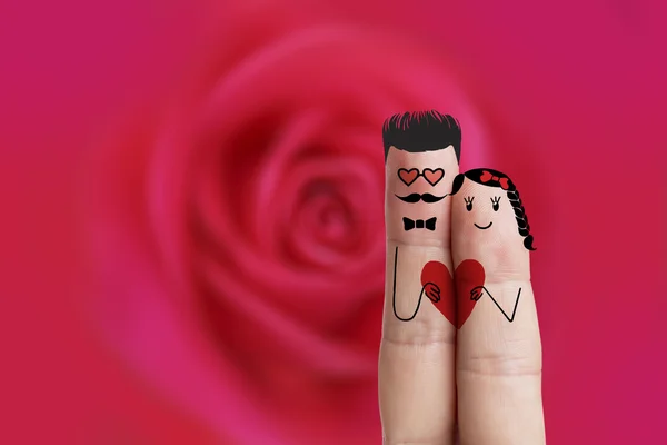 Finger art. Hipster lovers is embracing and holding red heart. Stock Image — Stock Photo, Image
