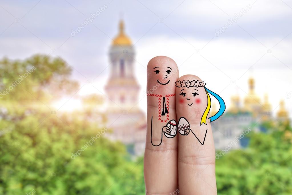 Conceptual Easter Finger Art. Ukrainian Couple Are Holding Painted Eggs. Stock Image