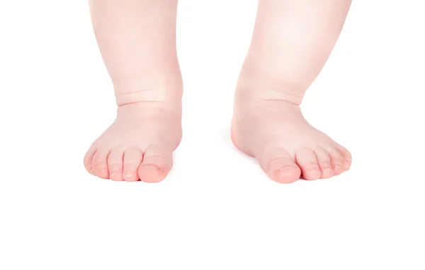 Дитячі ноги ізольовані на білому — стокове фото
