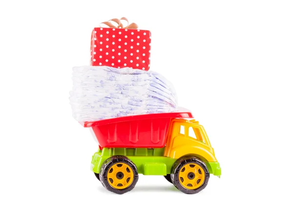 Toy truck with a pile of diapers — Stock Photo, Image