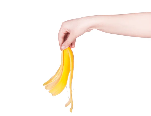 The woman's hand holds a banana — Stock Photo, Image