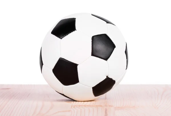 Футбольний м'яч на дошках . — стокове фото