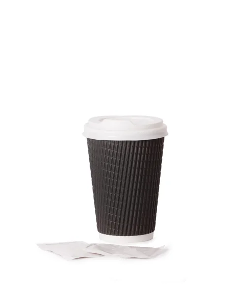 Wegwerp kopje koffie in de hand — Stockfoto