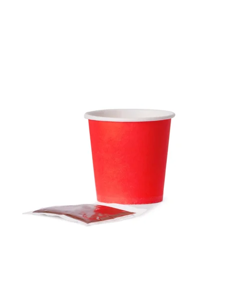 Disposable cup of coffee in hand — Stock Photo, Image