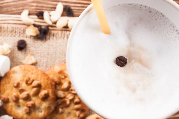 Coffee with marshmallows on the boards.