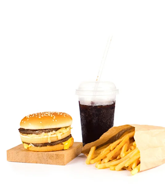 Patatine fritte e cola su sfondo bianco — Foto Stock