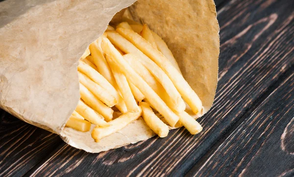 Mucchio di patatine fritte appetitose — Foto Stock