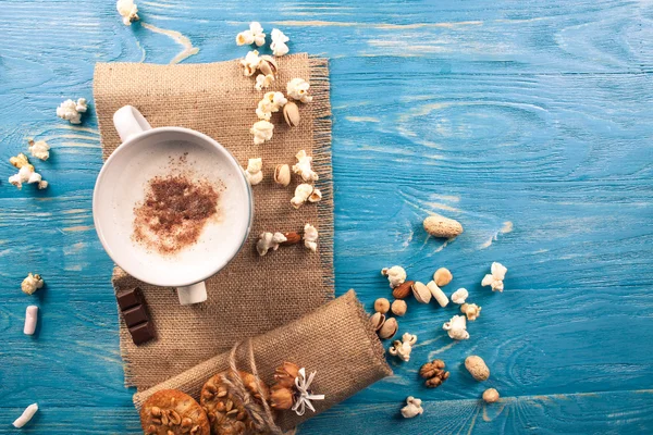 Coffee with marshmallows on the boards.