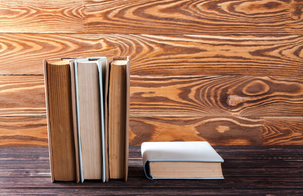 Old books on wooden table