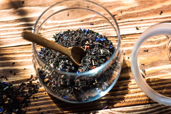 Black leaf tea with additives — Stock Photo, Image