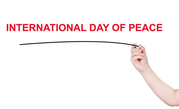 Palavra do Dia Internacional da Paz escrever sobre fundo branco — Fotografia de Stock