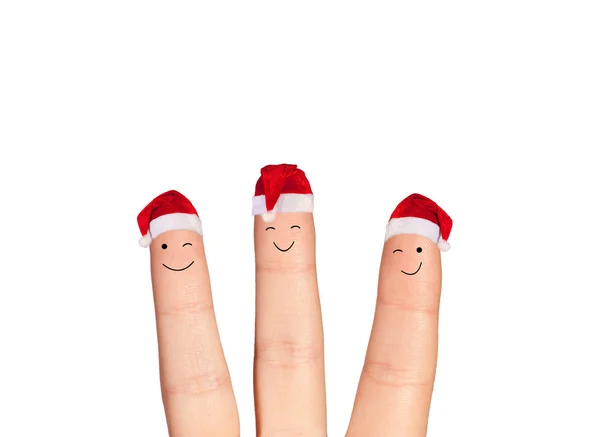 Fingers faces in Santa hats — Stock Photo, Image