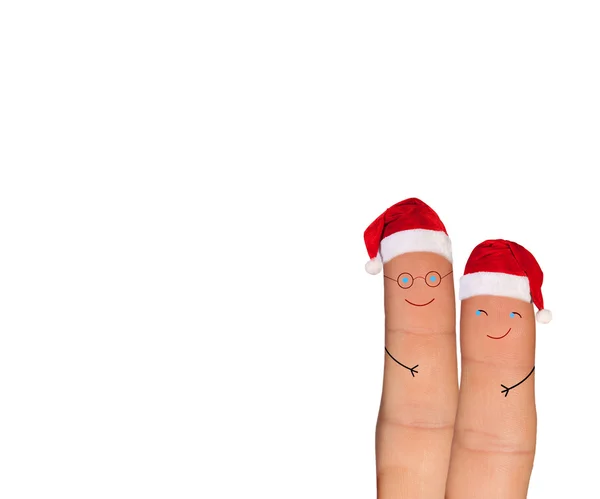 Fingers faces in Santa hats — Stock Photo, Image