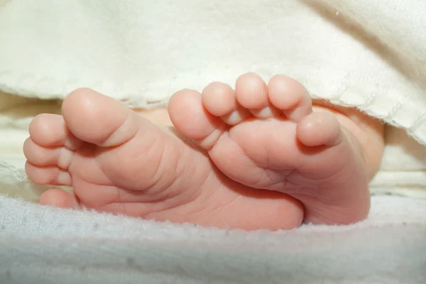 Foto på baby fötter — Stockfoto
