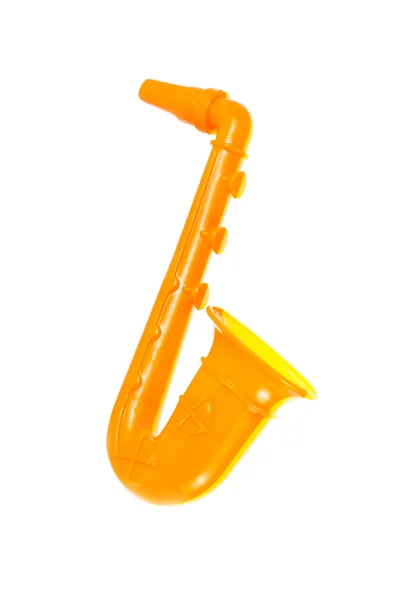 Saxofone de brinquedo laranja — Fotografia de Stock