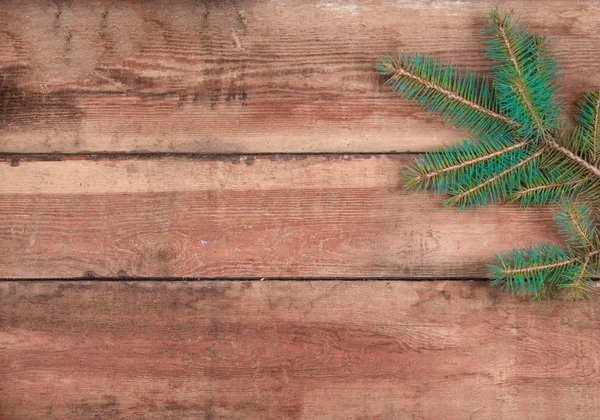 Weihnachtsdekoration auf Holzplatte — Stockfoto