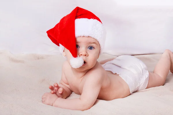 Beautiful little baby celebrates Christmas. — Stock Photo, Image