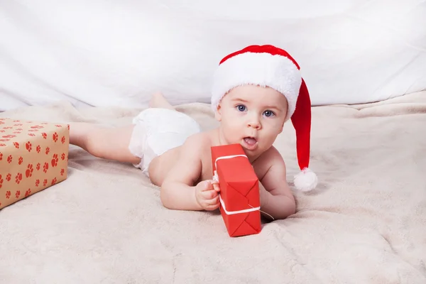 Beautiful little baby celebrates Christmas. — Stock Photo, Image