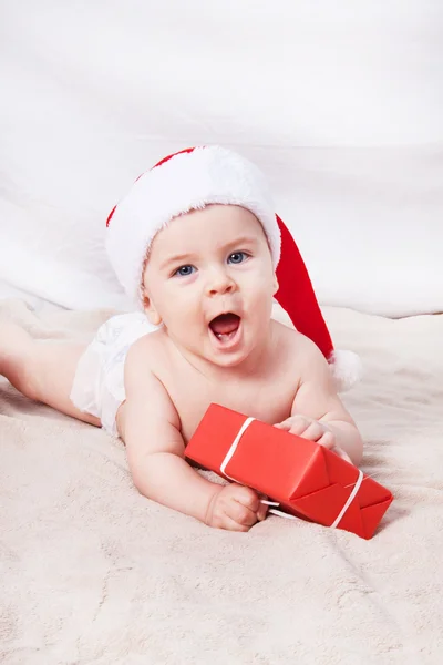 Beautiful little baby celebrates Christmas. — Stock Photo, Image