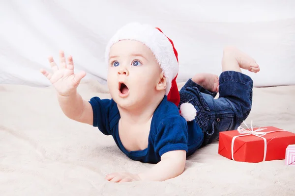 Beautiful little baby celebrates Christmas. — Stock Photo, Image