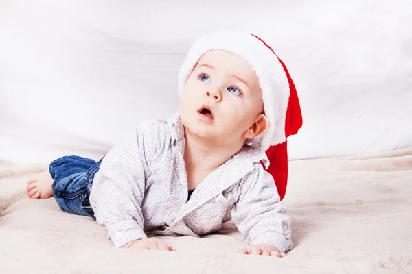 Beautiful little baby celebrates Christmas. — Stock Photo, Image