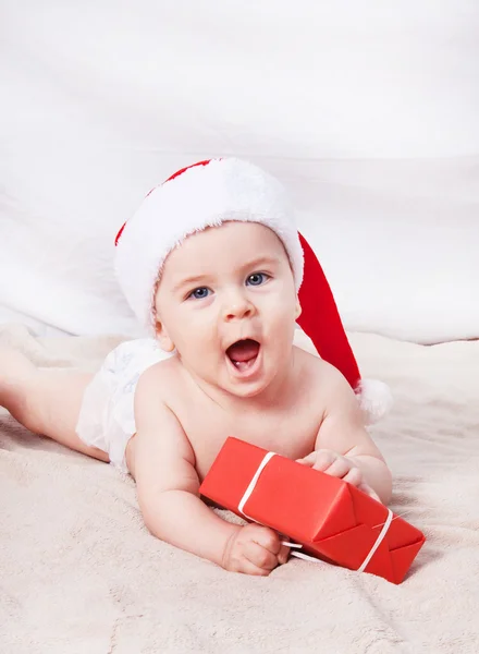 Beautiful little baby celebrates Christmas. — Stock Photo, Image