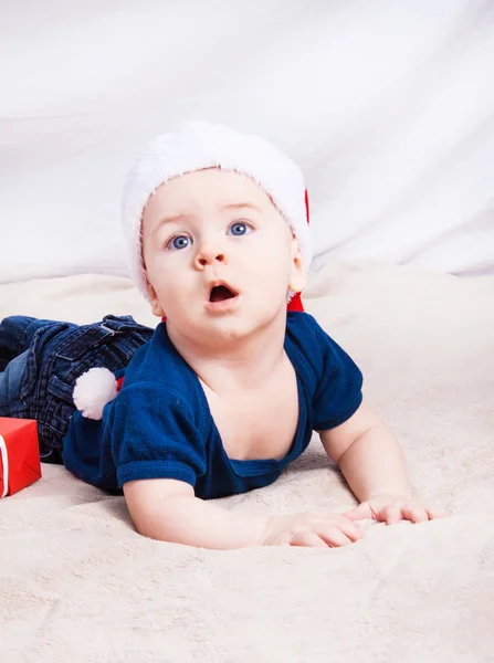 Beautiful little baby celebrates Christmas. — Stock Photo, Image