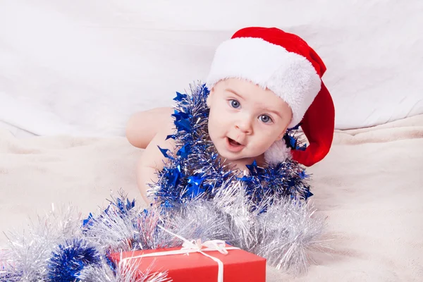 Beautiful little baby celebrates Christmas. — Stock Photo, Image