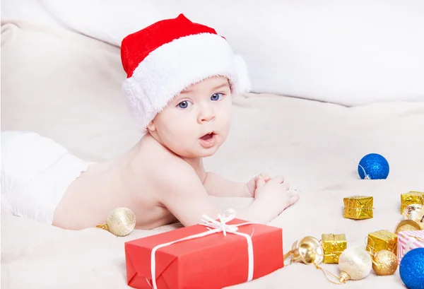 Beautiful little baby celebrates Christmas — Stock Photo, Image