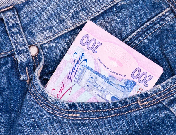 Dinero ucraniano en jeans — Foto de Stock