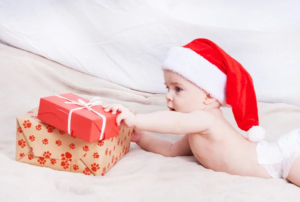 Beautiful little baby celebrates Christmas. — Stock Photo, Image