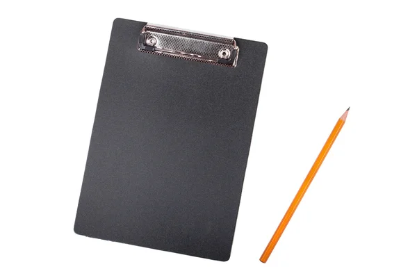 Klembord met lege witte stuk papier en zwart potlood — Stockfoto