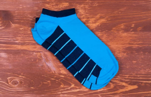 Ζευγάρι κάλτσες στο ξύλο — Φωτογραφία Αρχείου