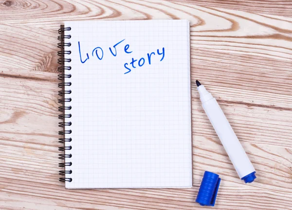 Book writing love story  and pen