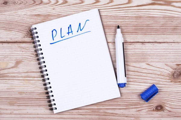 Notebook with an action plan — Stock Photo, Image