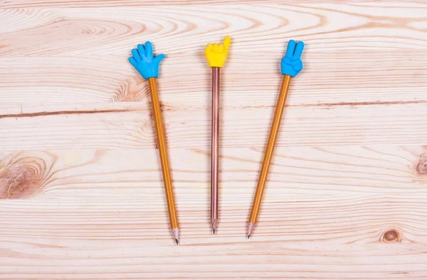 Pencil on old wood desk — Stock Photo, Image