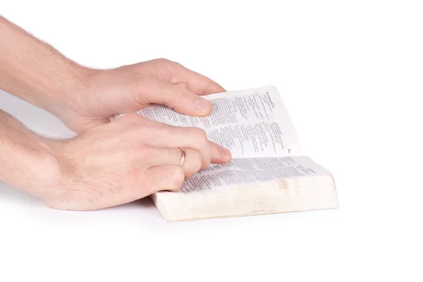 Hand en een open Bijbel — Stockfoto
