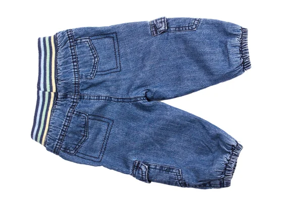 Дитячий одяг - джинси ізольовані — стокове фото