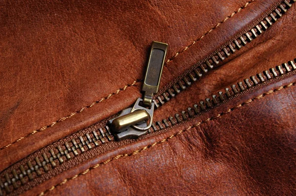 Zipper of a brown leather jacket — Stock Photo, Image