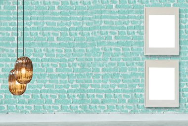 Yeni yeşil dekoratif tuğla duvar, boş çerçeve, modern lamba ve iç tasarım. ahşap zemin