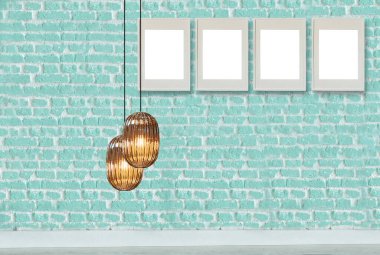 yeşil dekoratif tuğla duvar, boş çerçeve, modern lamba ve iç tasarım. ahşap zemin