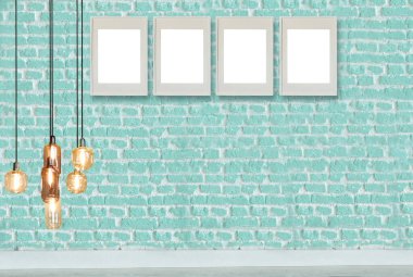 yeşil dekoratif tuğla duvar, boş çerçeve, modern lamba ve iç tasarım. ahşap zemin