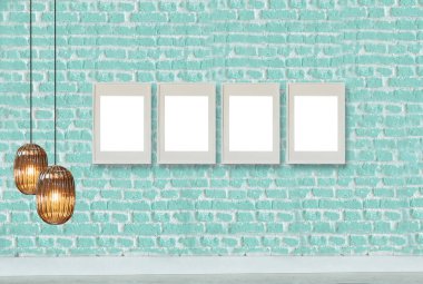 yeşil dekoratif tuğla duvar, boş çerçeve, modern lamba ve iç tasarım