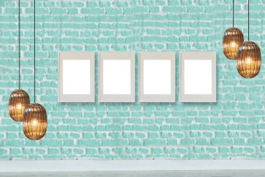 yeşil dekoratif tuğla duvar, boş çerçeve, modern lamba ve iç tasarım