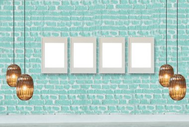 yeşil dekoratif tuğla duvar, boş çerçeve, modern lamba ve iç tasarım