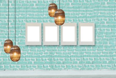 yeşil dekoratif tuğla duvar, boş çerçeve, modern lamba ve iç tasarım
